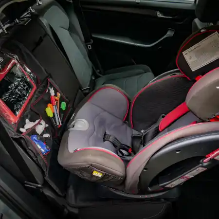 Reduceri HUSA PROTECTIE PENTRU SCAUN AUTO COPII CU BUZUNAR TABLETA